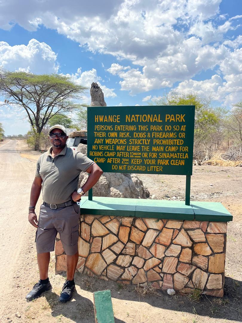 Ingwe Collective guide at the Hwange National Park entrance